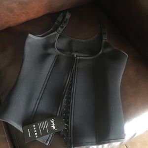 Brand new size medium waist trainer/faja